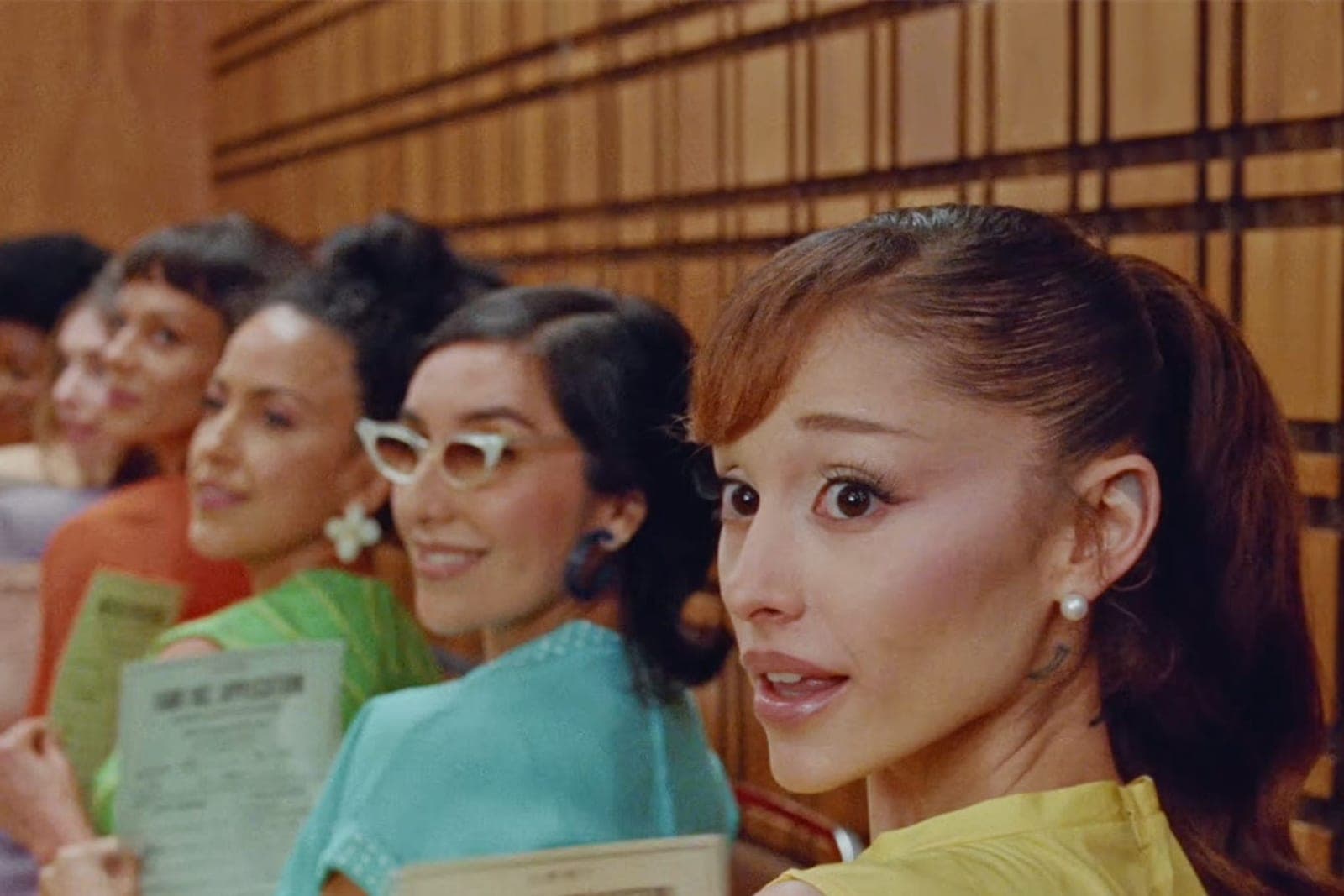 Ariana Grande photographed in the music video for Petal