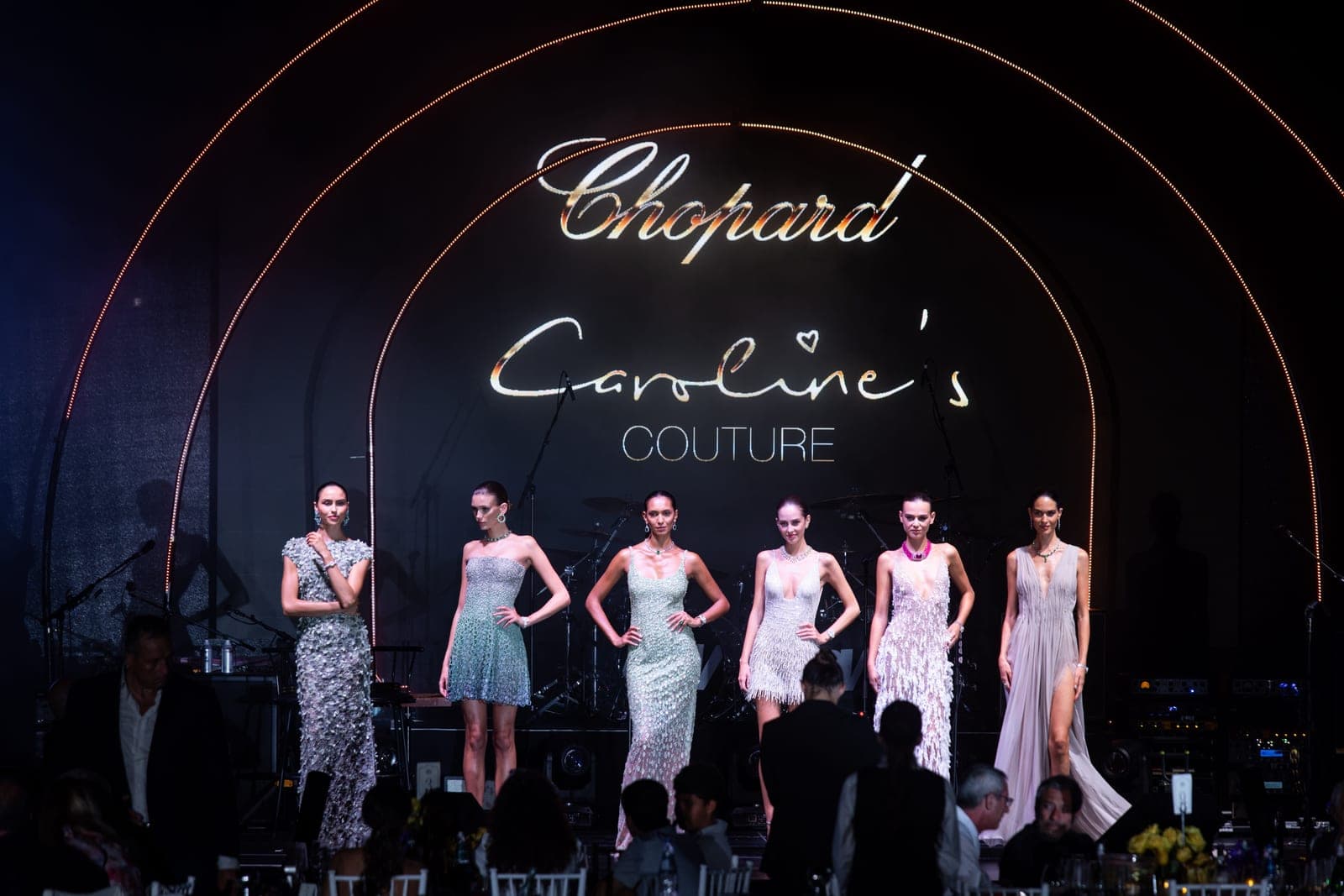 Models on stage in Chopard high jewellery and Caroline's Couture at BIG ART Festival in Porto Cervo