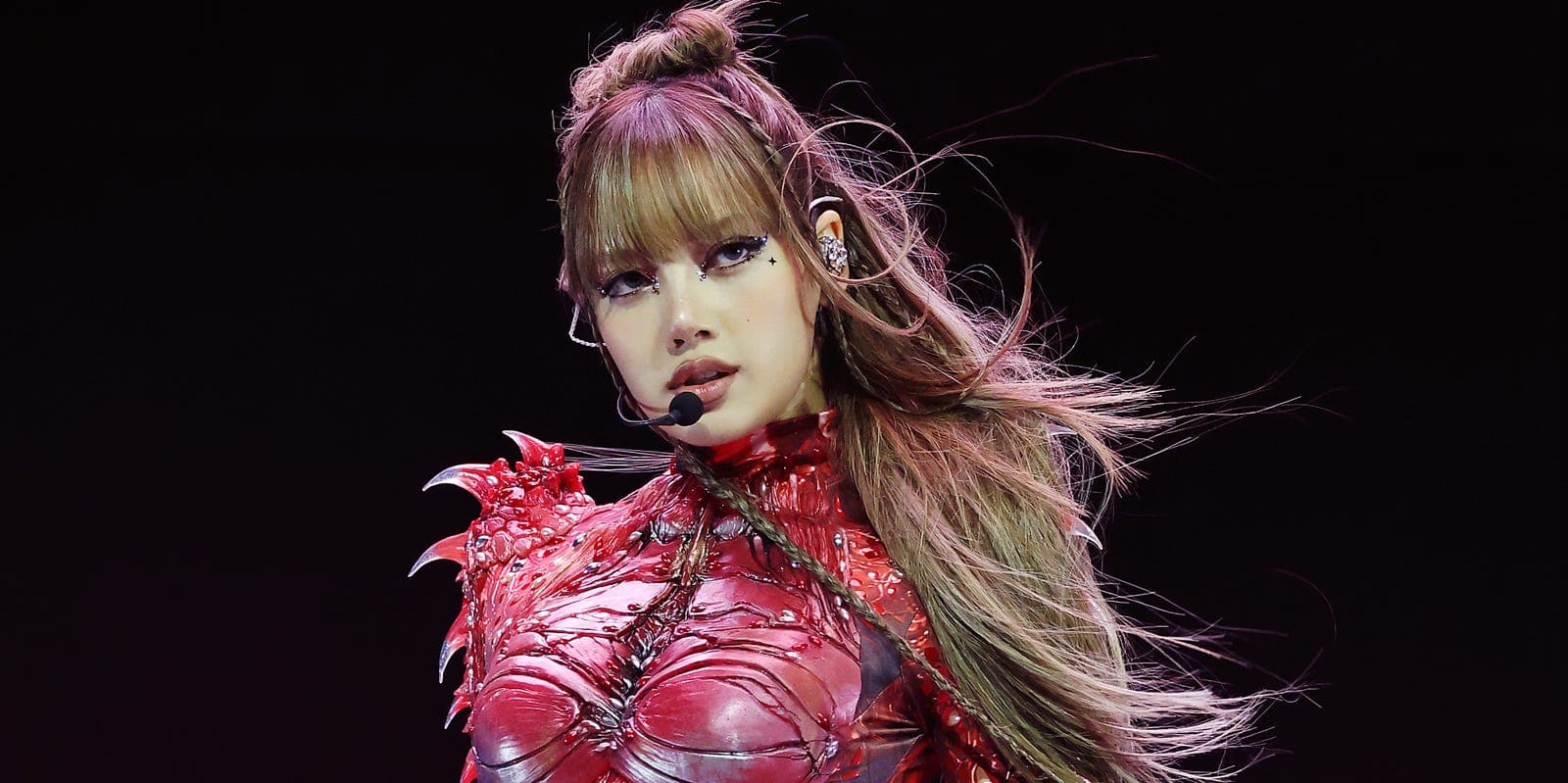 Lisa from Blackpink performing on stage