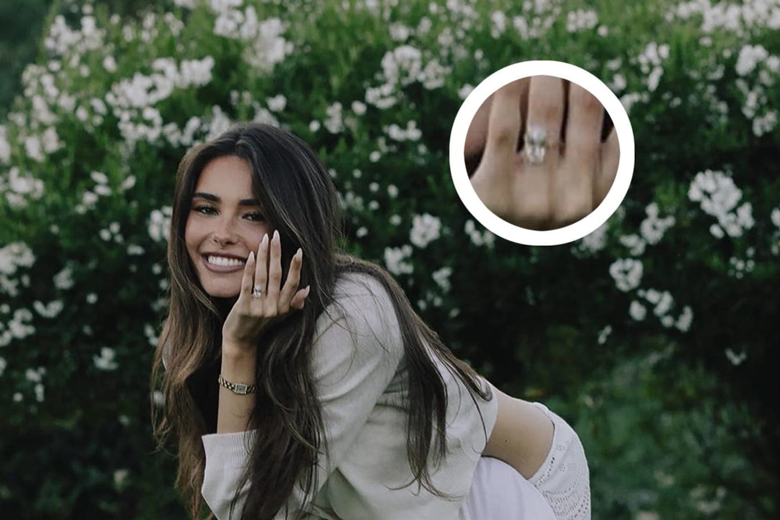 A close view of Madison Beer's cushion cut diamond engagement ring