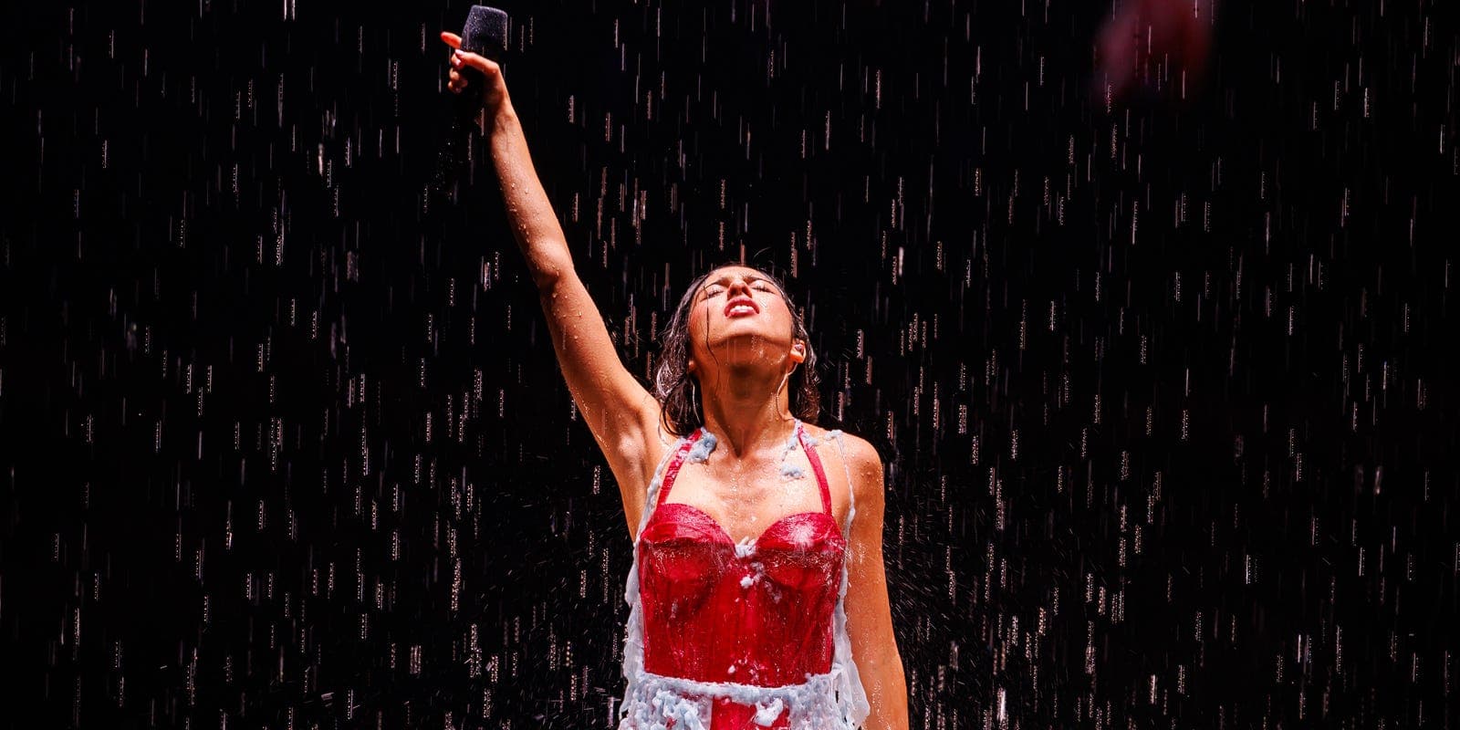 Olivia Rodrigo performing on her Unraveled Tour