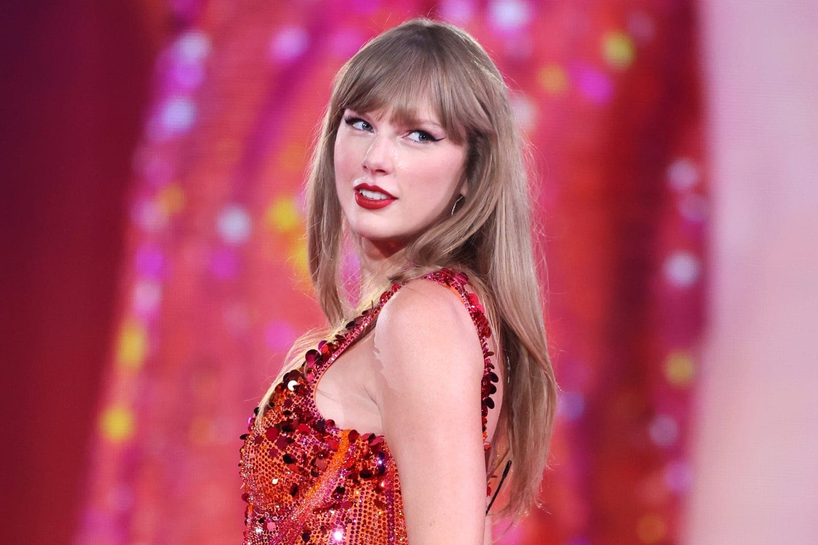Taylor Swift performing on stage during the Eras Tour
