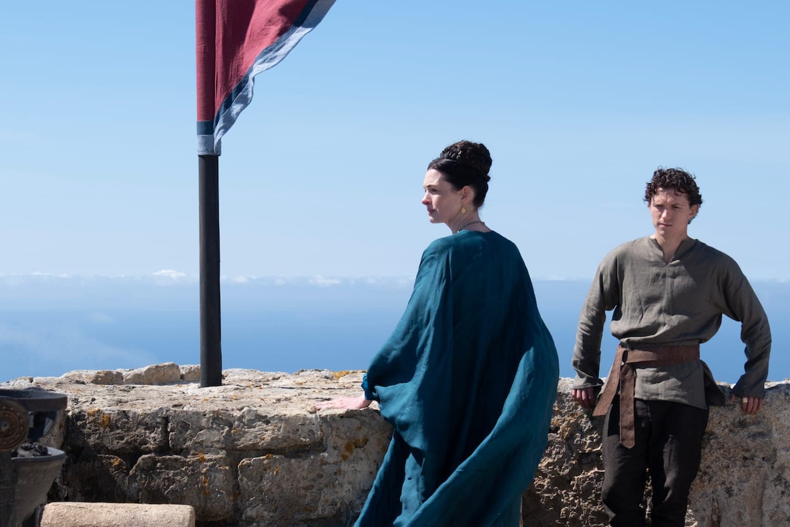 Two actors in costume in a scene from The Odyssey