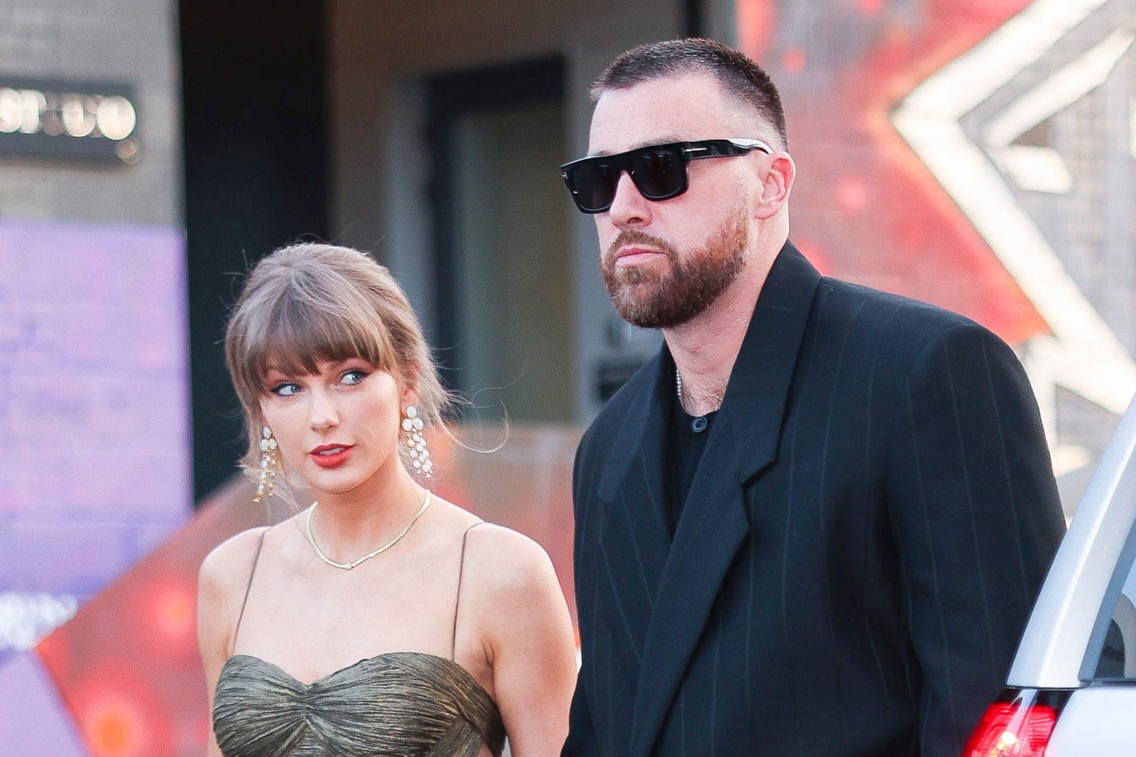 Taylor Swift and Travis Kelce photographed together at a public appearance