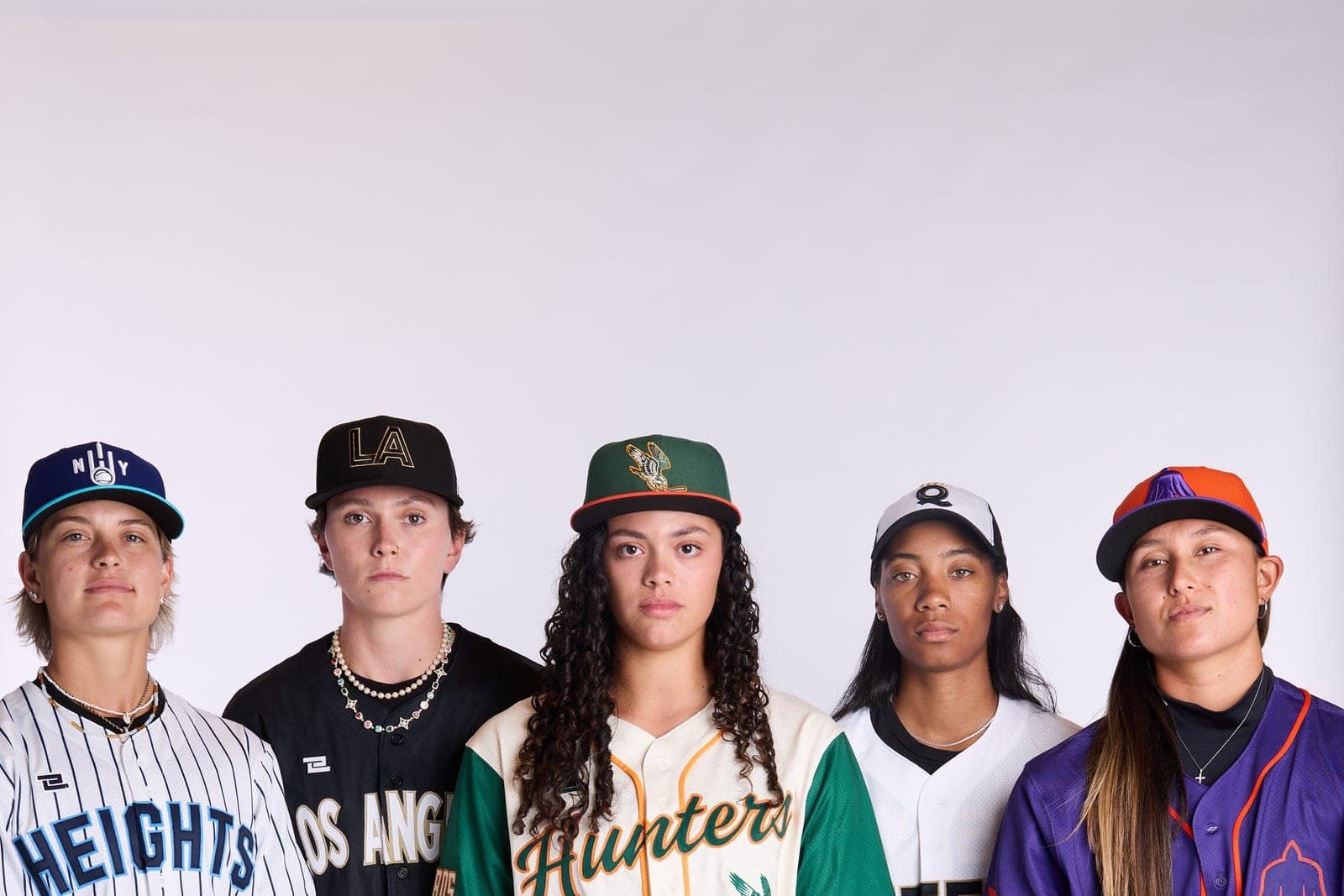 Five WPBL players photographed together in their team uniforms