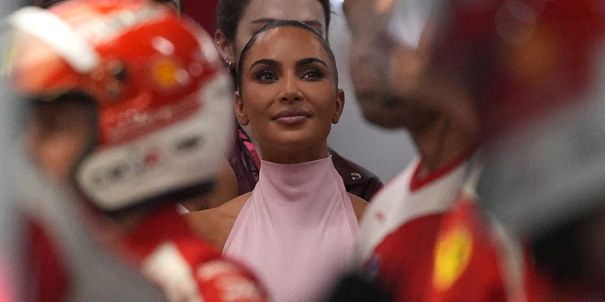 Kim Kardashian in a blush pink gown at the Singapore Grand Prix