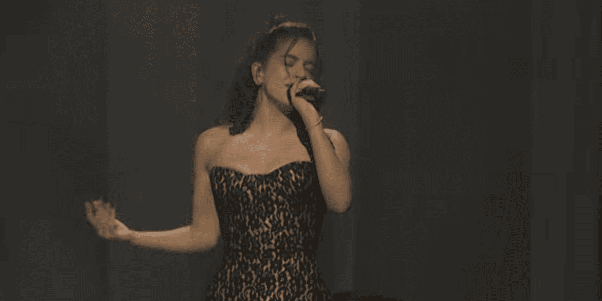 Rosalia performing on Saturday Night Live in a black and white corseted tutu dress