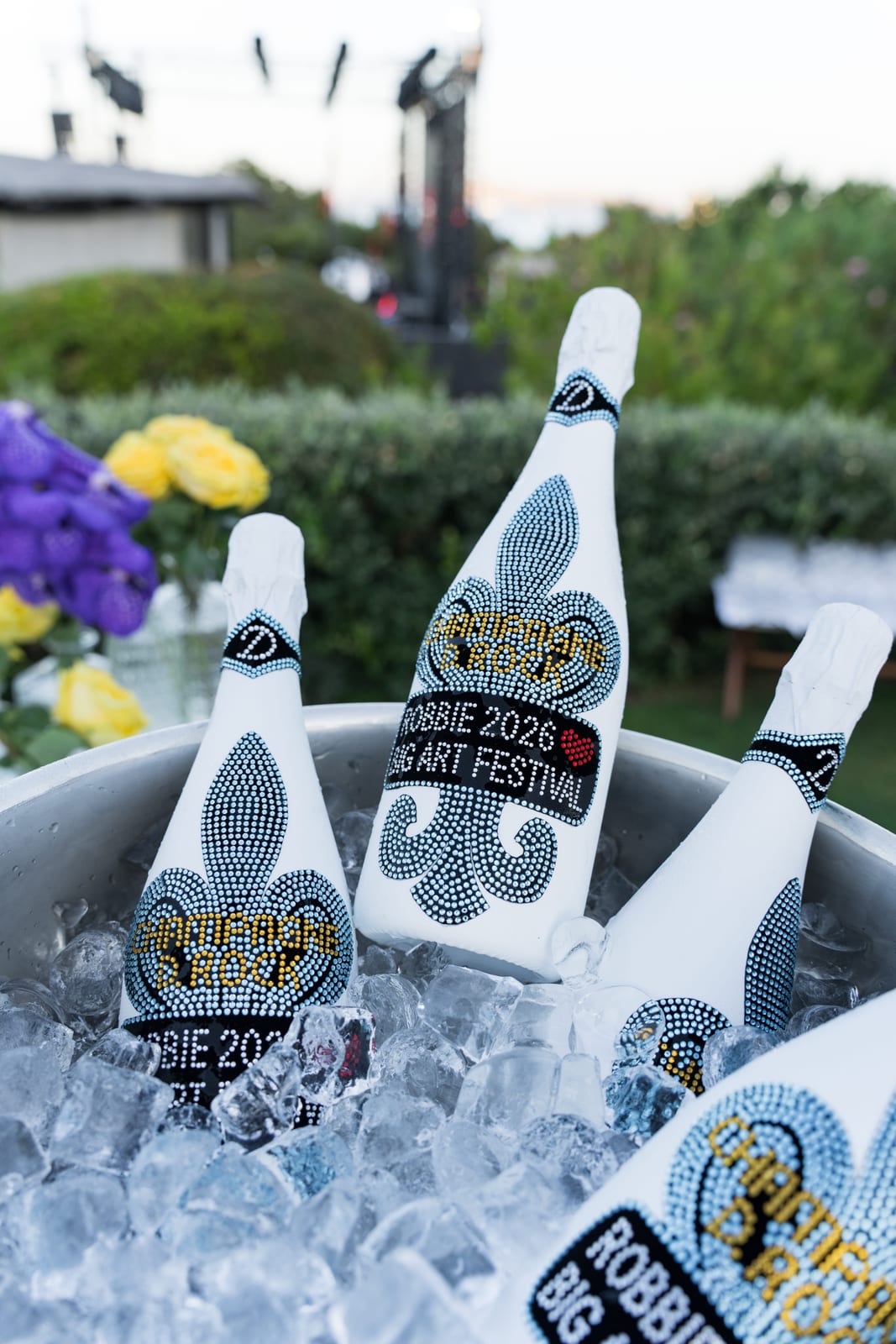 Crystal decorated D.Rock Champagne bottles on ice at BIG ART Festival
